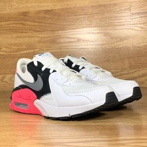 Nike Women size 7 hot pink,gray,black,and white